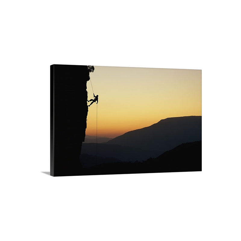 A Man Rappels Down A Cliff Republic Of South Africa Wall Art - Canvas - Gallery Wrap