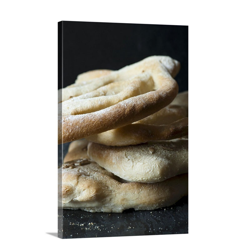 A stack Of Fougasse Bread Close Up Wall Art - Canvas - Gallery Wrap