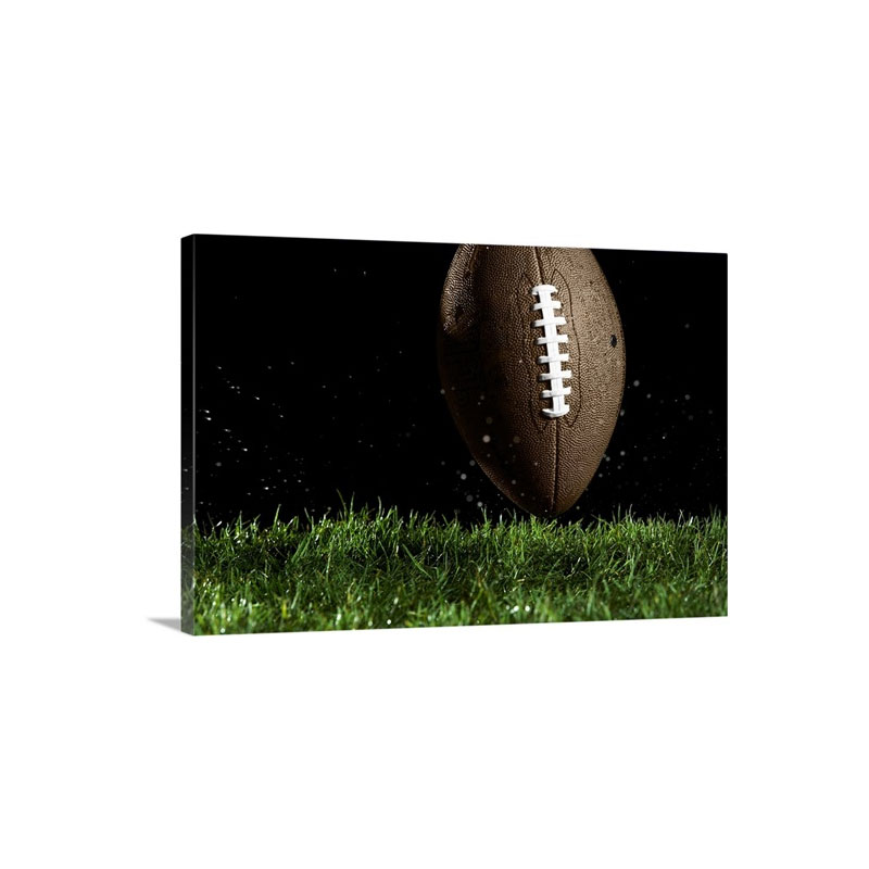 Football In Motion Over Grass Wall Art - Canvas - Gallery Wrap
