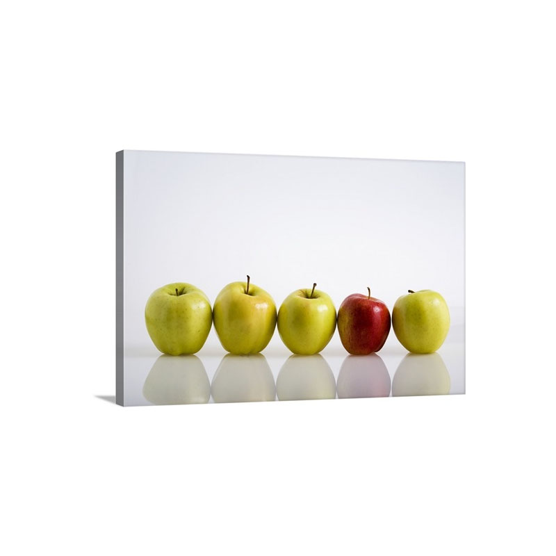 Four Yellow Apples With One Red Apple In A Row Wall Art - Canvas - Gallery Wrap