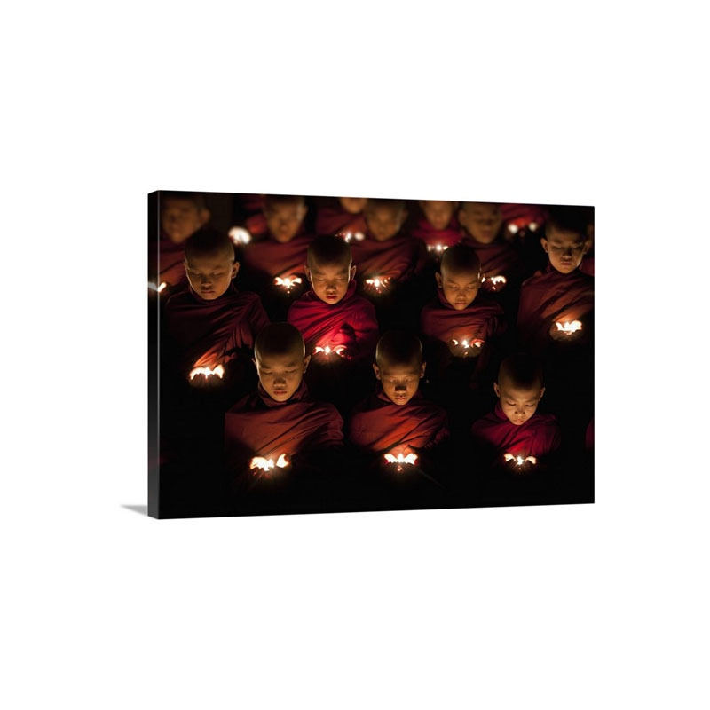 Monk Boys Praying By Candle Light In Their Monastery Yangon Burma Wall Art - Canvas - Gallery Wrap