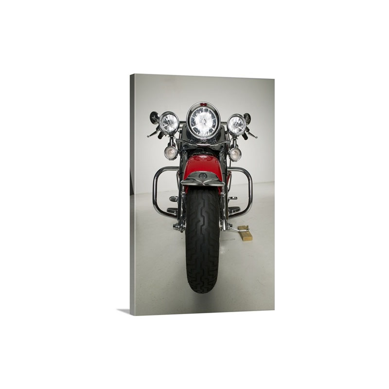 Red Motorcycle Parked In Studio Wall Art - Canvas - Gallery Wrap