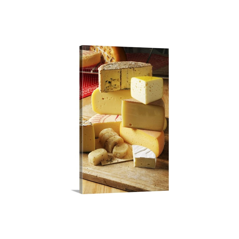 Stack Of Various Cheese On Chopping Board Wall Art - Canvas - Gallery Wrap