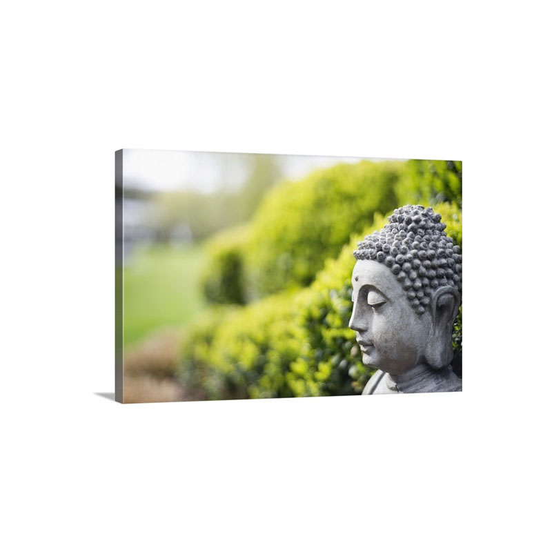 Statue Of Buddha In A Garden Wall Art - Canvas - Gallery Wrap