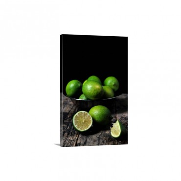 A Bowl Of Limes Whole And Halved Wall Art - Canvas - Gallery Wrap
