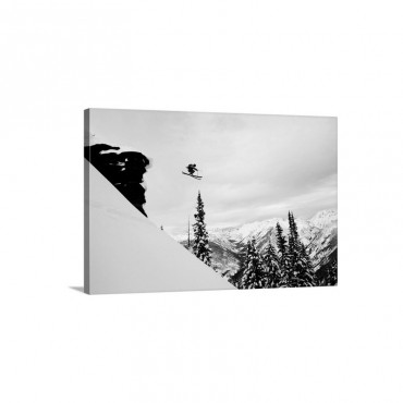 A Skier Jumping Off A Cliff In The Backcountry In Colorado Wall Art - Canvas - Gallery Wrap