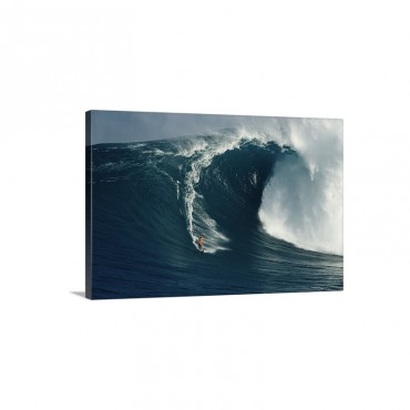 A Surfer Rides A Powerful Wave Off The North Shore Of Maui Island Hawaii Wall Art - Canvas - Gallery Wrap