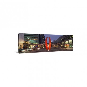 Buildings In A City Lit Up At Dusk Sergels Torg Stockholm Sweden Wall Art - Canvas - Gallery Wrap