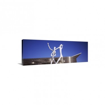 Dancers Sculpture By Jonathan Borofsky In Front Of A Building Colorado Convention Center Denver Colorado Wall Art - Canvas - Gallery Wrap