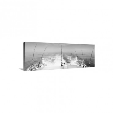 Fishing Reels With Cast Lines Off The Back Of A Boat Wall Art - Canvas - Gallery Wrap