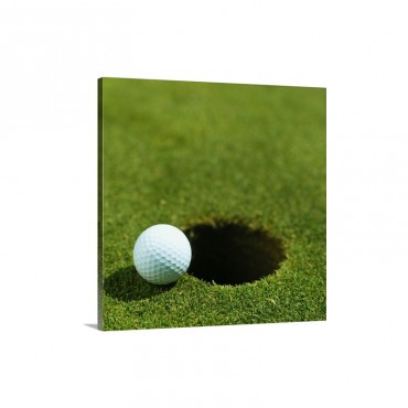 Golf Ball On The Edge Of The Hole Wall Art - Canvas - Gallery Wrap