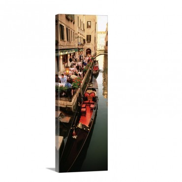 Gondolas Moored Outside Of A Cafe Venice Italy Wall Art - Canvas - Gallery Wrap