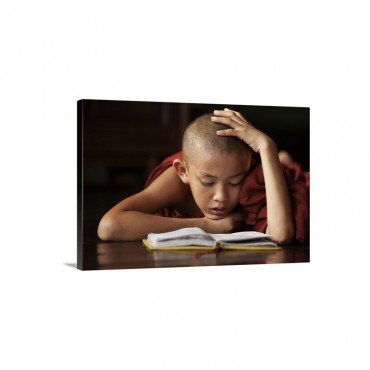 Monk Boy Reading On The Floor Of His Monastery Wall Art - Canvas - Gallery Wrap