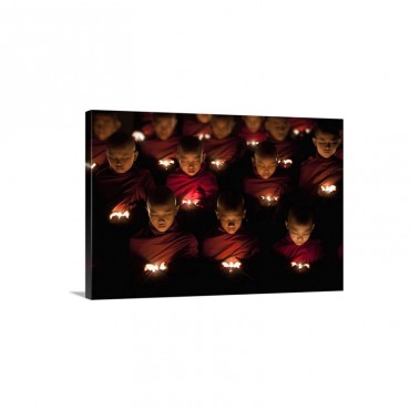 Monk Boys Praying By Candle Light In Their Monastery Yangon Burma Wall Art - Canvas - Gallery Wrap