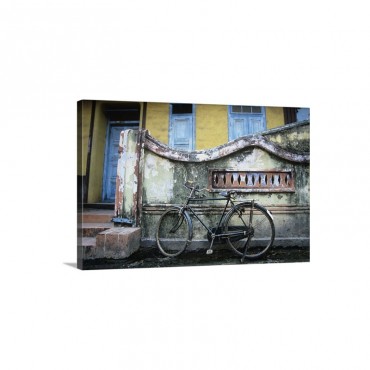 Old Fashioned Bicycle Left By Crumbling Wall Wall Art - Canvas - Gallery Wrap