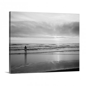 Rear View Of Woman On Beach Looking Toward Horizon Wall Art - Canvas - Gallery Wrap