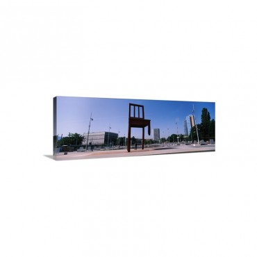 Sculpture Of A Chair United Nation Square Geneva Switzerland Wall Art - Canvas - Gallery Wrap