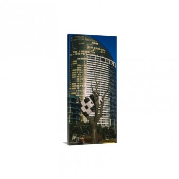 Sculpture Of A Cow On A Tree In Front Of A Building Harbor Esplanade Melbourne Victoria Australia Wall Art - Canvas - Gallery Wrap