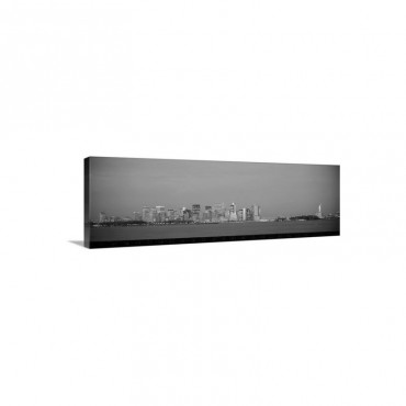 Skyscrapers And A Statue At The Waterfront Statue Of Liberty Manhattan New York City New York State Wall Art - Canvas - Gallery Wrap