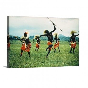 Tutsi Men Recall Days Of Glory In An Exuberant Dance Wall Art - Canvas - Gallery Wrap