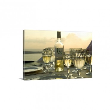 Wine Glasses With A Wine Bottle On A Table Santorini Cyclades Islands Greece Wall Art - Canvas - Gallery Wrap